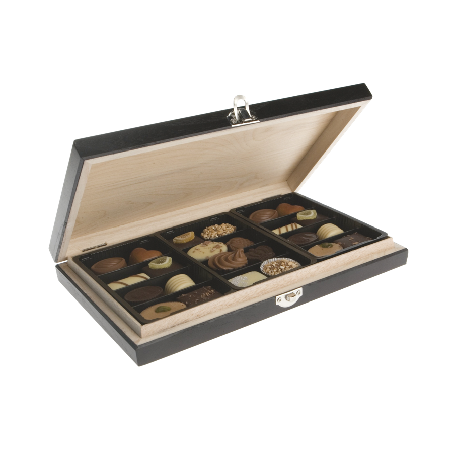 Skicka lyxiga praliner i vacker träask